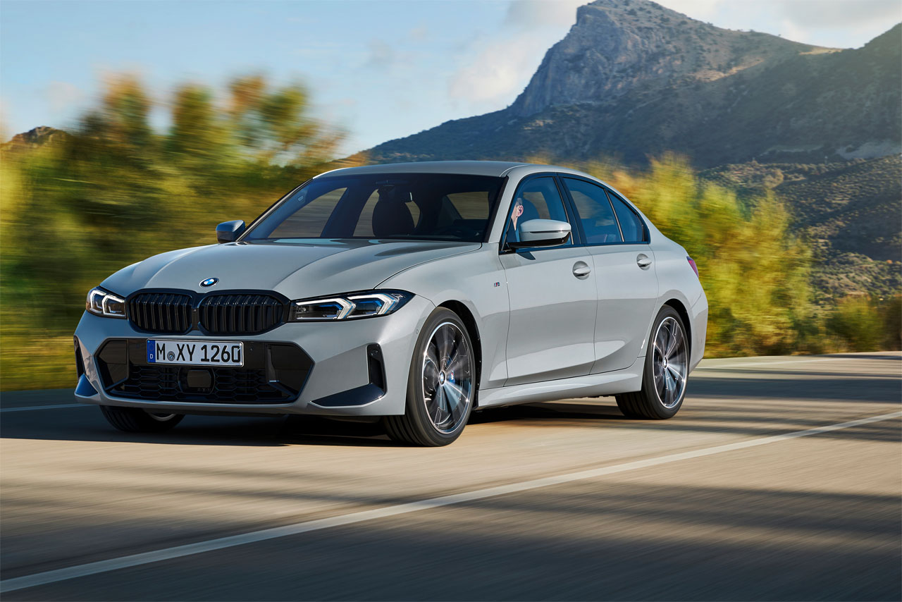  BMW 3 Series Sedan driving on a country road