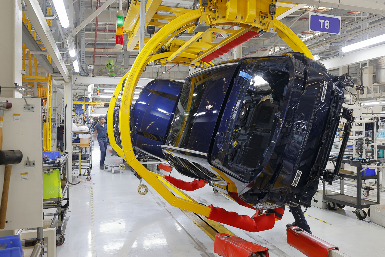  A BMW vehicle being assembled on an automated assembly line.