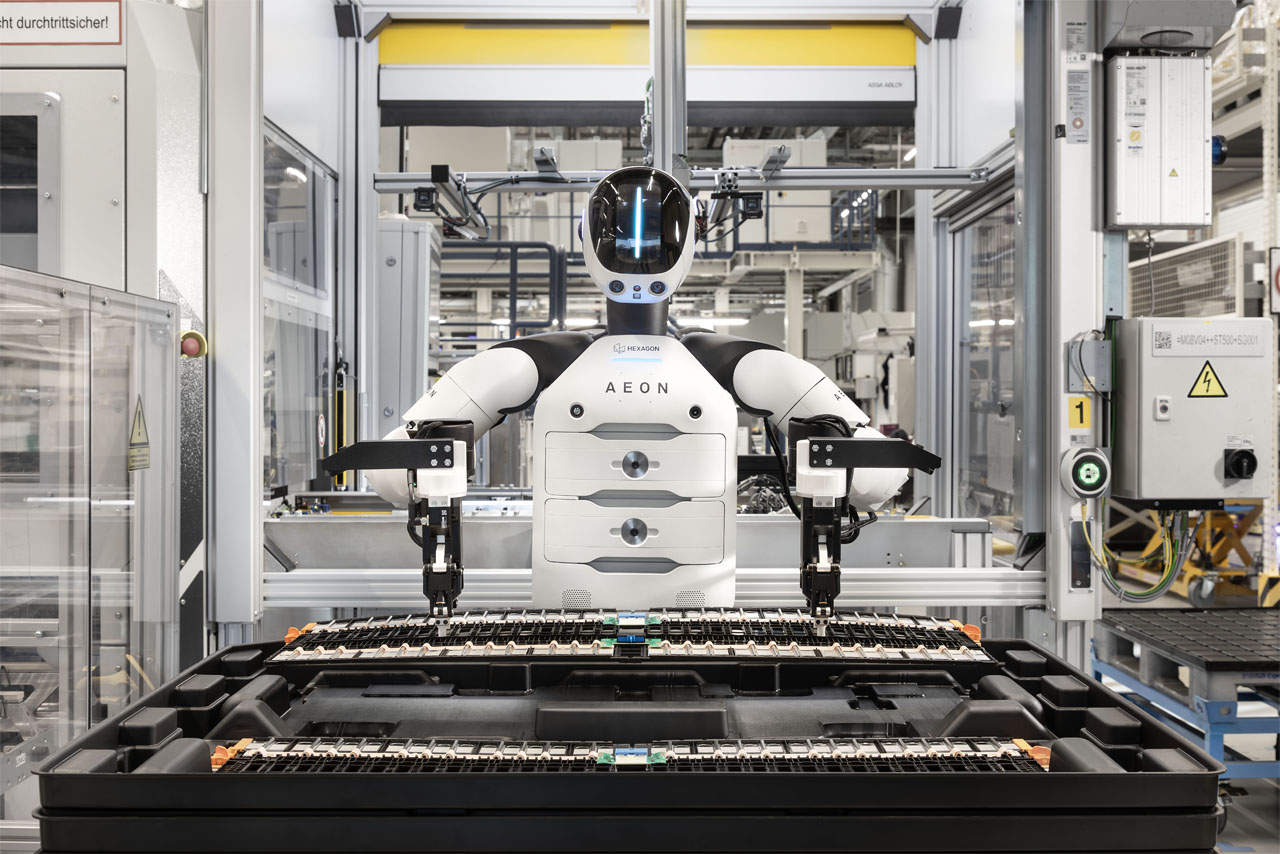 An AEON humanoid robot assembles battery modules in production at BMW Group Plant Leipzig.