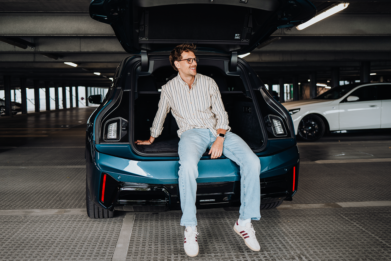 Phillip im BMW iX.
