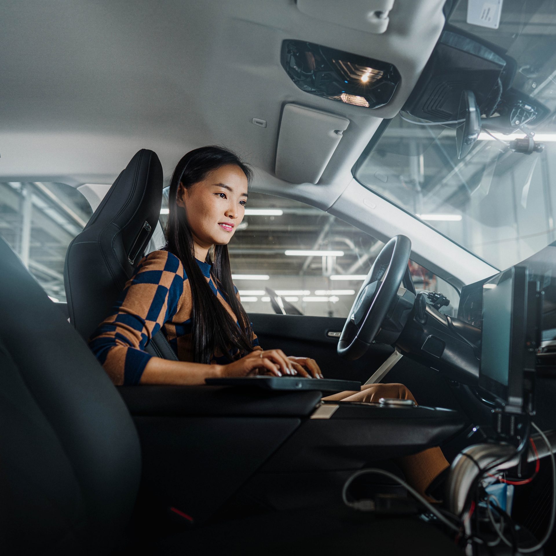 BMW Group employee in a vehicle