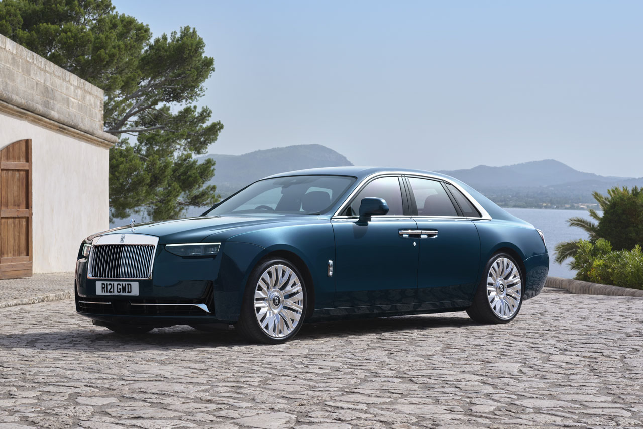  A sleek Rolls-Royce Ghost parked, showcasing its luxurious design and elegant lines.