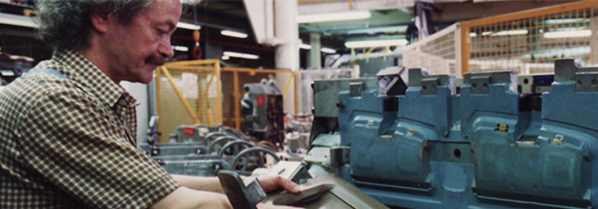 Factory worker manufacturing a dashboard