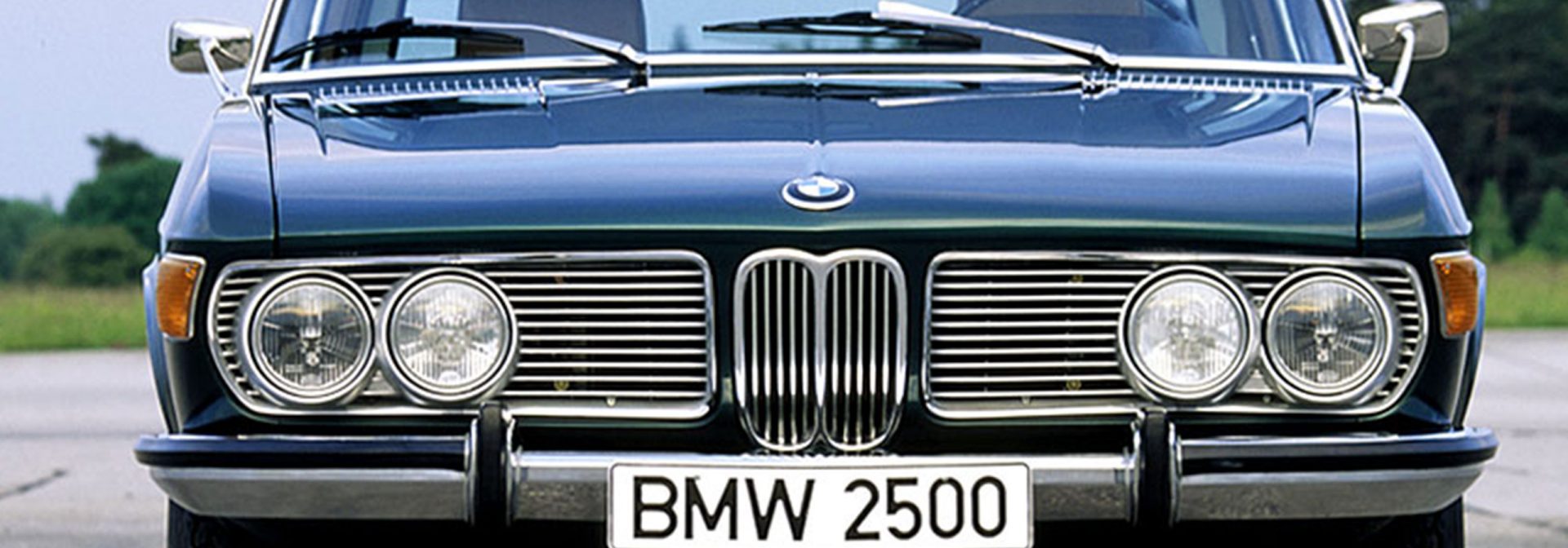 Classic BMW 2500 car front view with distinctive grille and headlights.
