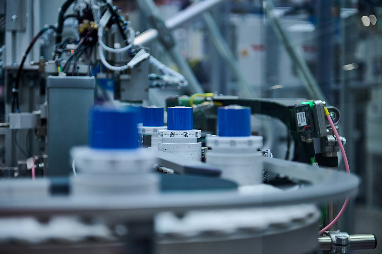 Battery cells on an assembly line
