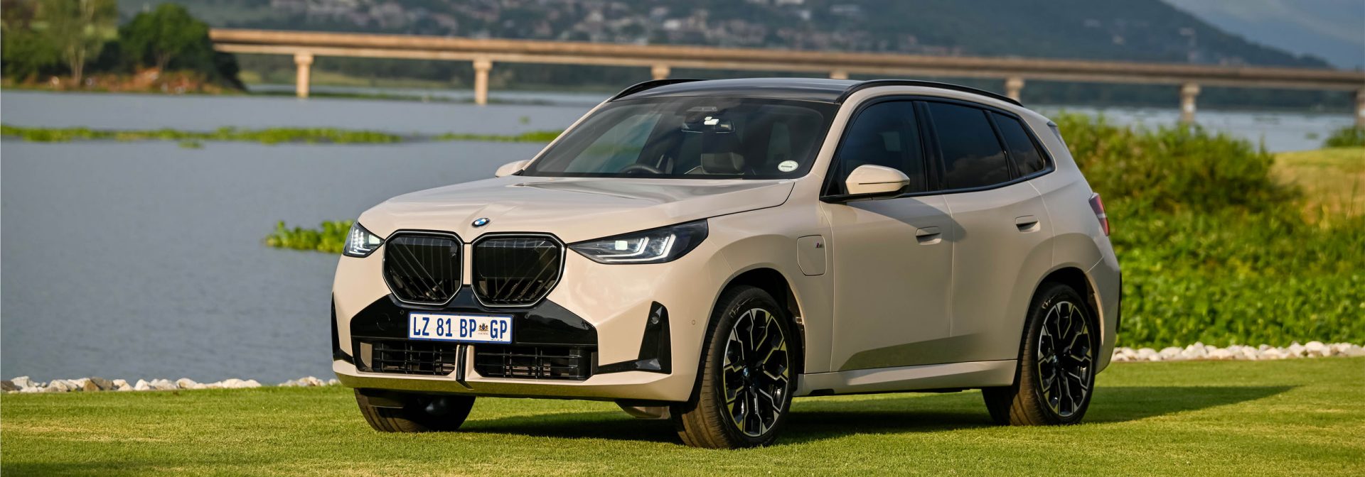 BMW X3 xDrive30e review: SUV with hybrid drive and modern design on the road.