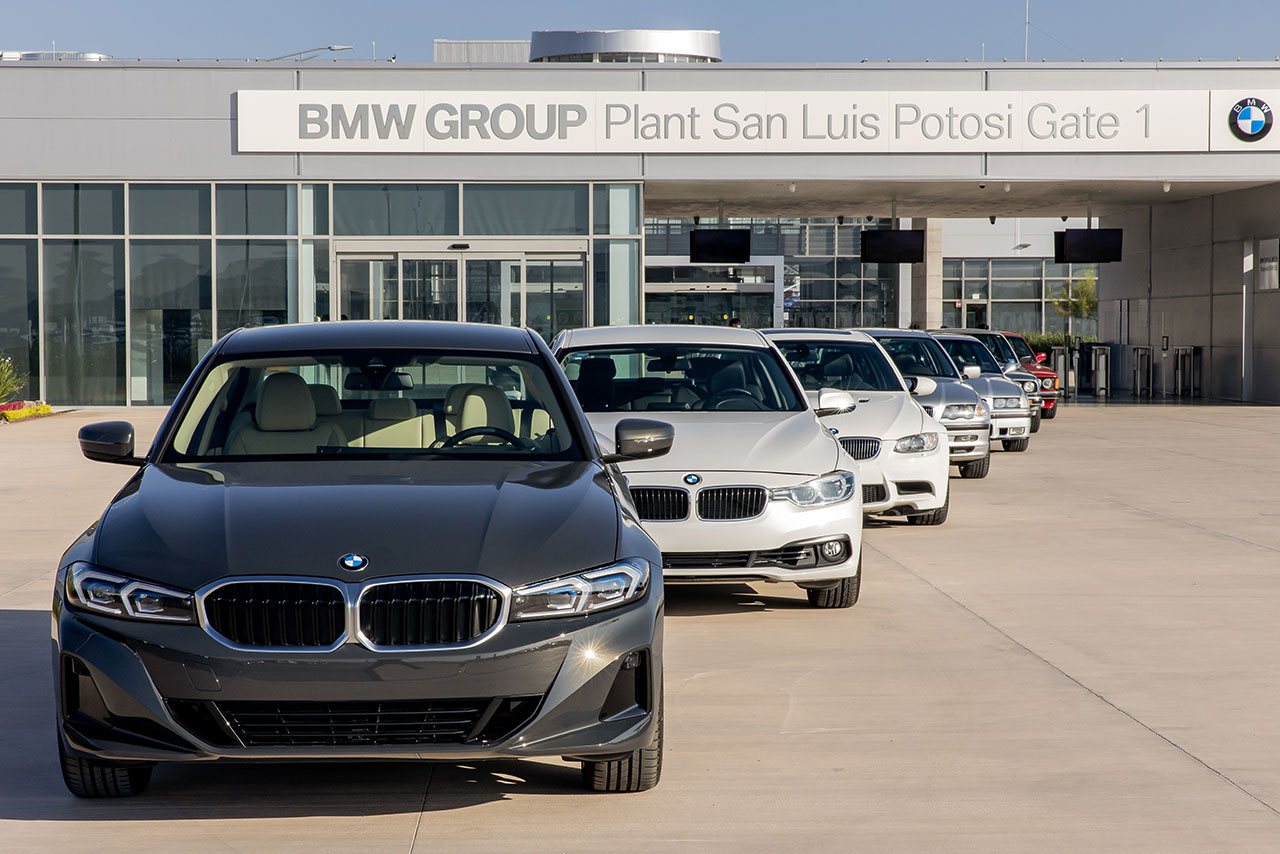 Seven different BMW 3series vehicles from new to old standing infront of the entrance to the BMW Group Plant San Luis Potosi 