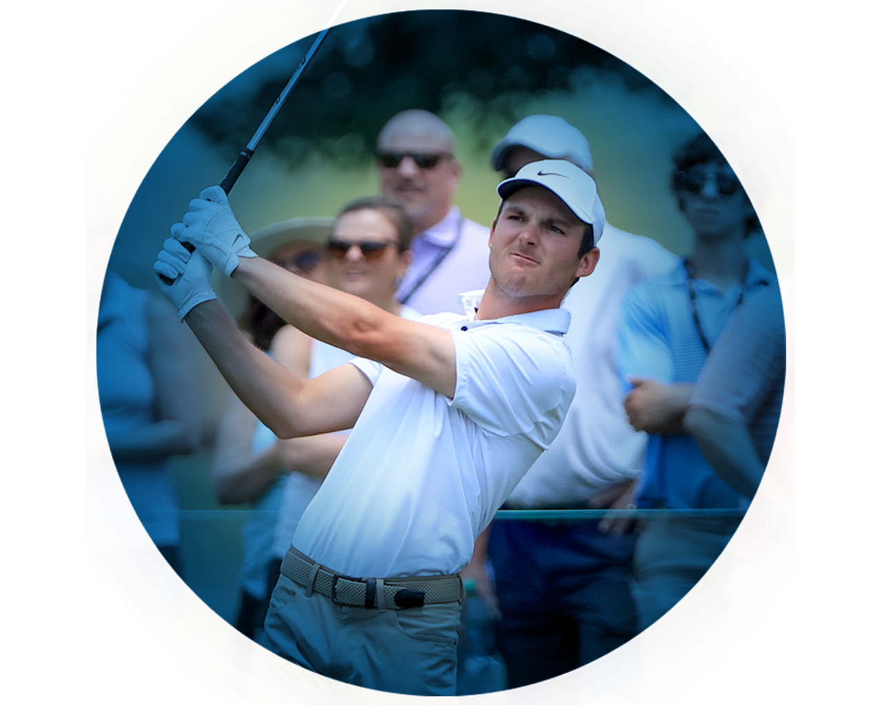 Golfer hitting golf ball out of the sand trap