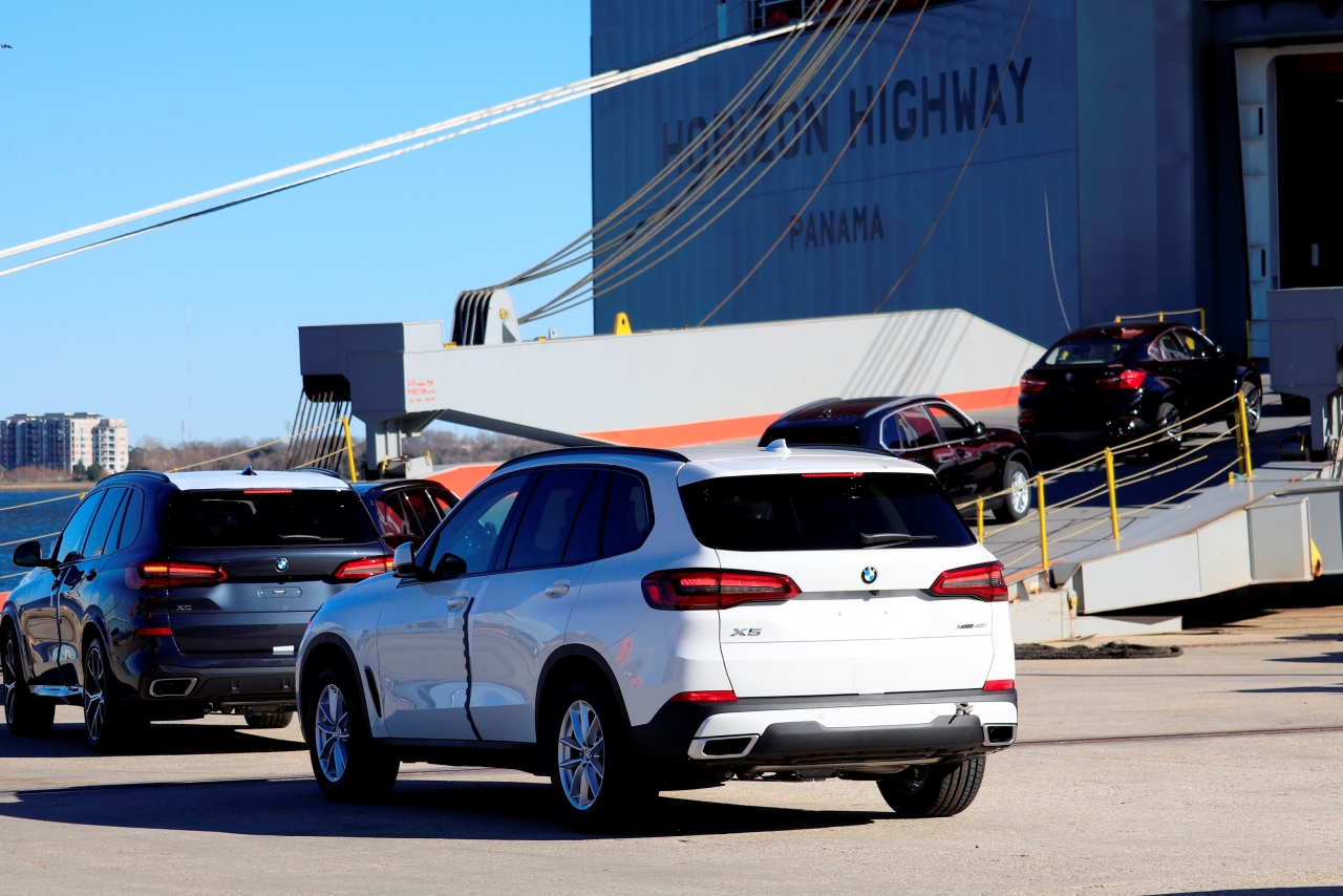 BMW XX5 at the end of a long line of BMW's being loaded on a ship at the Port of Charleston. 