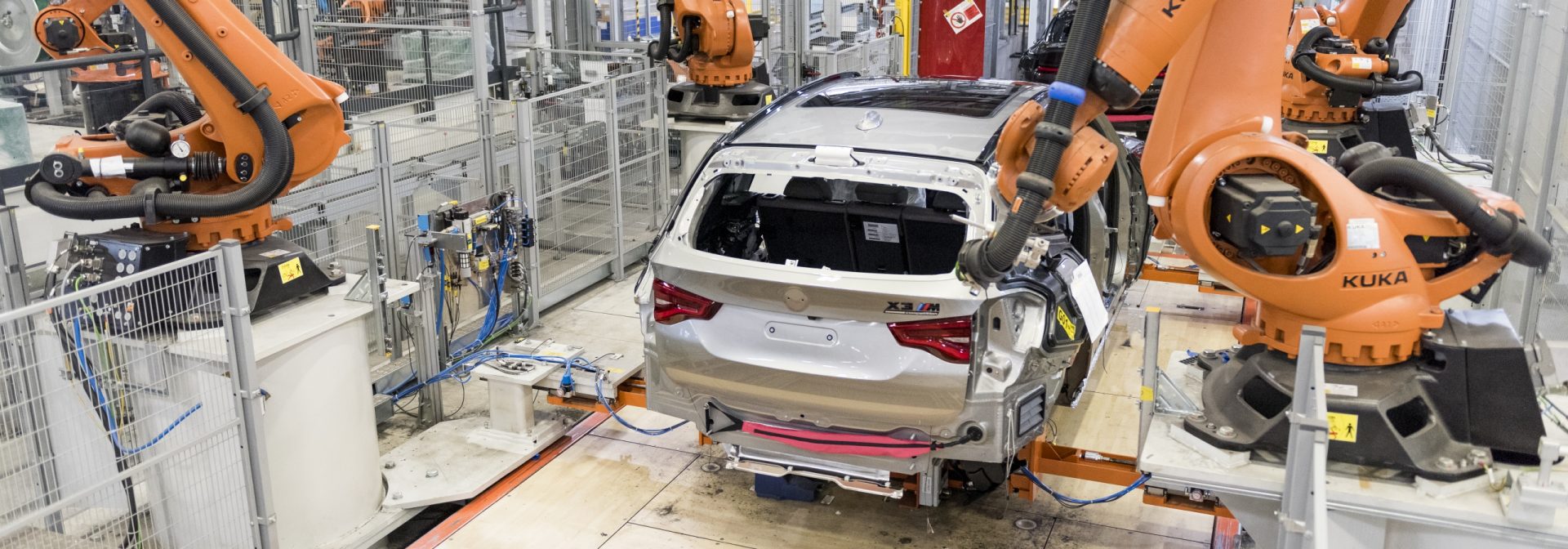 Assembly of the first BMW X3 M begins at Plant Spartanburg. It is shown in the body shop surrounded by Kuka robots. 